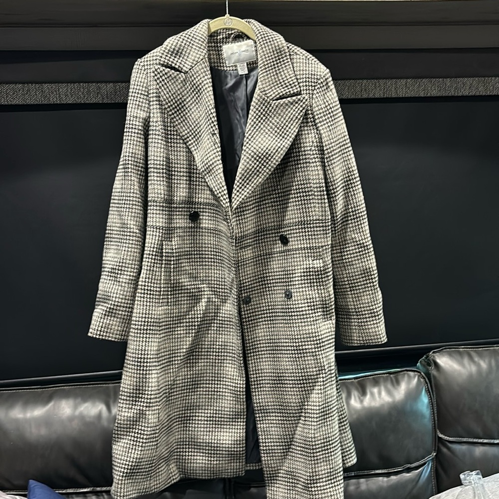 Like new coat size large. Black/white/gray plaid